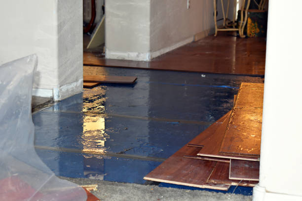 Professional Flood Damage Restoration technician working in Simla, CO